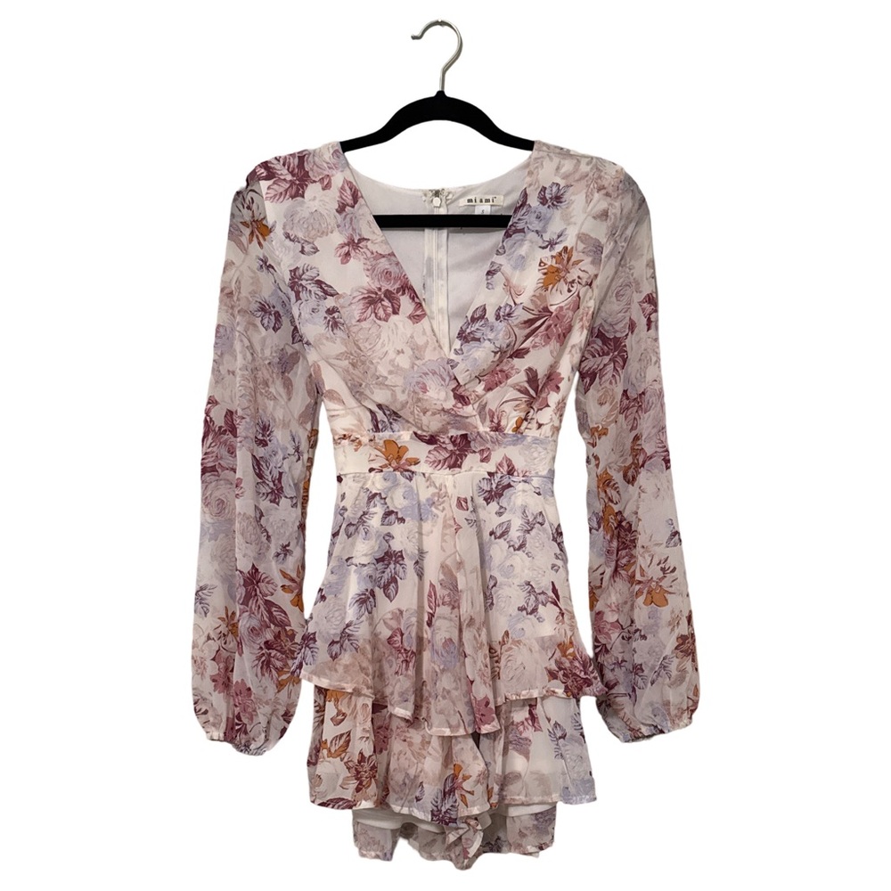 Pink floral romper from Francesca’s. Miami brand. 
Small.